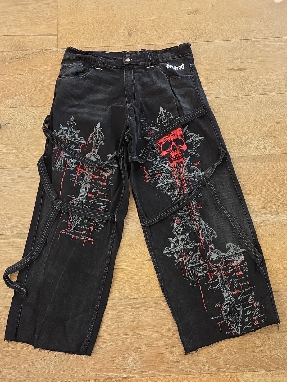 Bruised Men's XL Black Gothic Skull/Cross Graphic Strap Jeans Red & Gray Detail